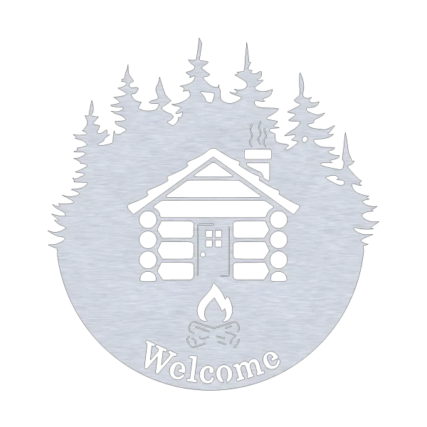 A circular metal wall sign with a laser-cut log cabin featuring a smoking chimney surrounded by pine trees. Below the cabin, the word 'Welcome' is cut out with a campfire symbol. The metallic finish adds a rustic charm, perfect for cabins or lodges.
